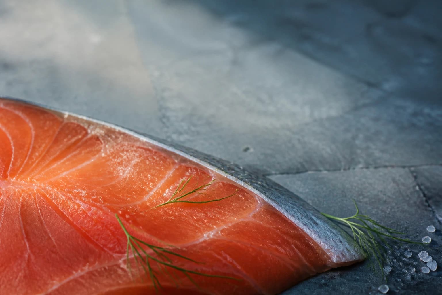 Raw salmon fillet with dill and salt, before curing